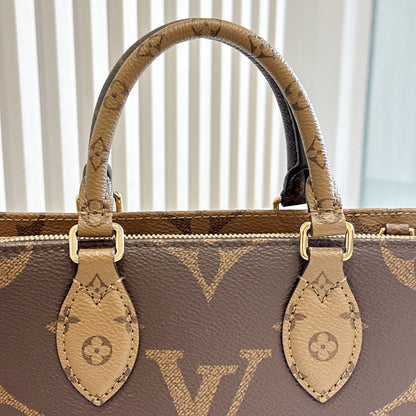 LV On The Go East West Reverse Monogram