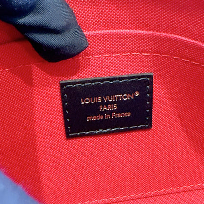 LV On The Go East West Reverse Monogram