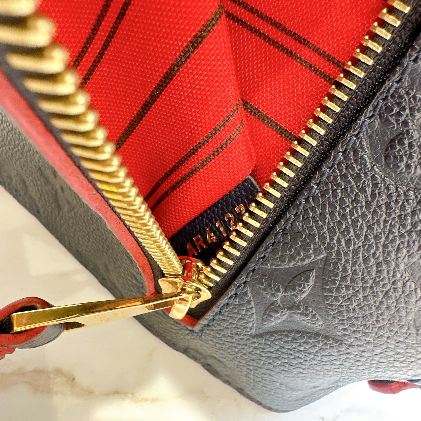 LV Pochette Metis Marine Rouge