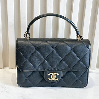 Chanel 21B Top Handle Quilted Black Flap Bag