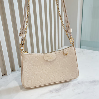 LV Easy Pouch On Strap In Creme