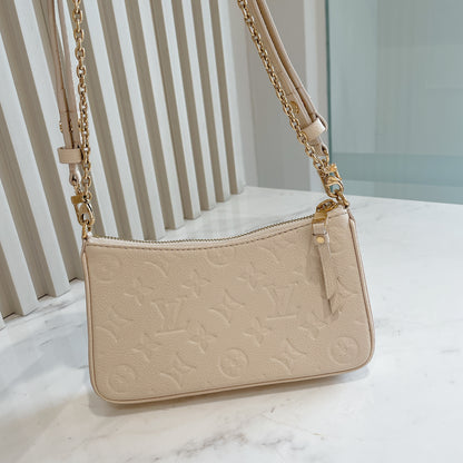 LV Easy Pouch On Strap In Creme