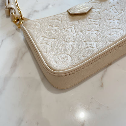 LV Easy Pouch On Strap In Creme