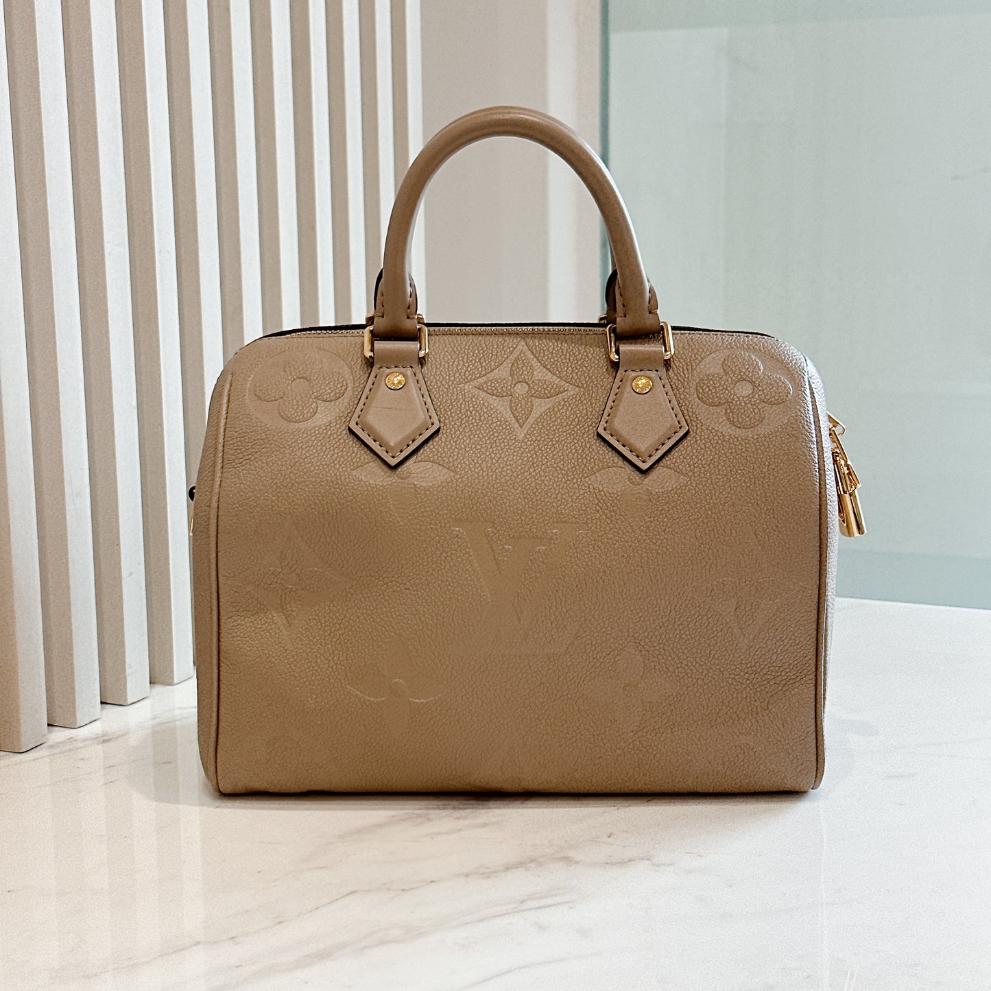 LV Speedy 25 in Tourterelle Empreinte Leather