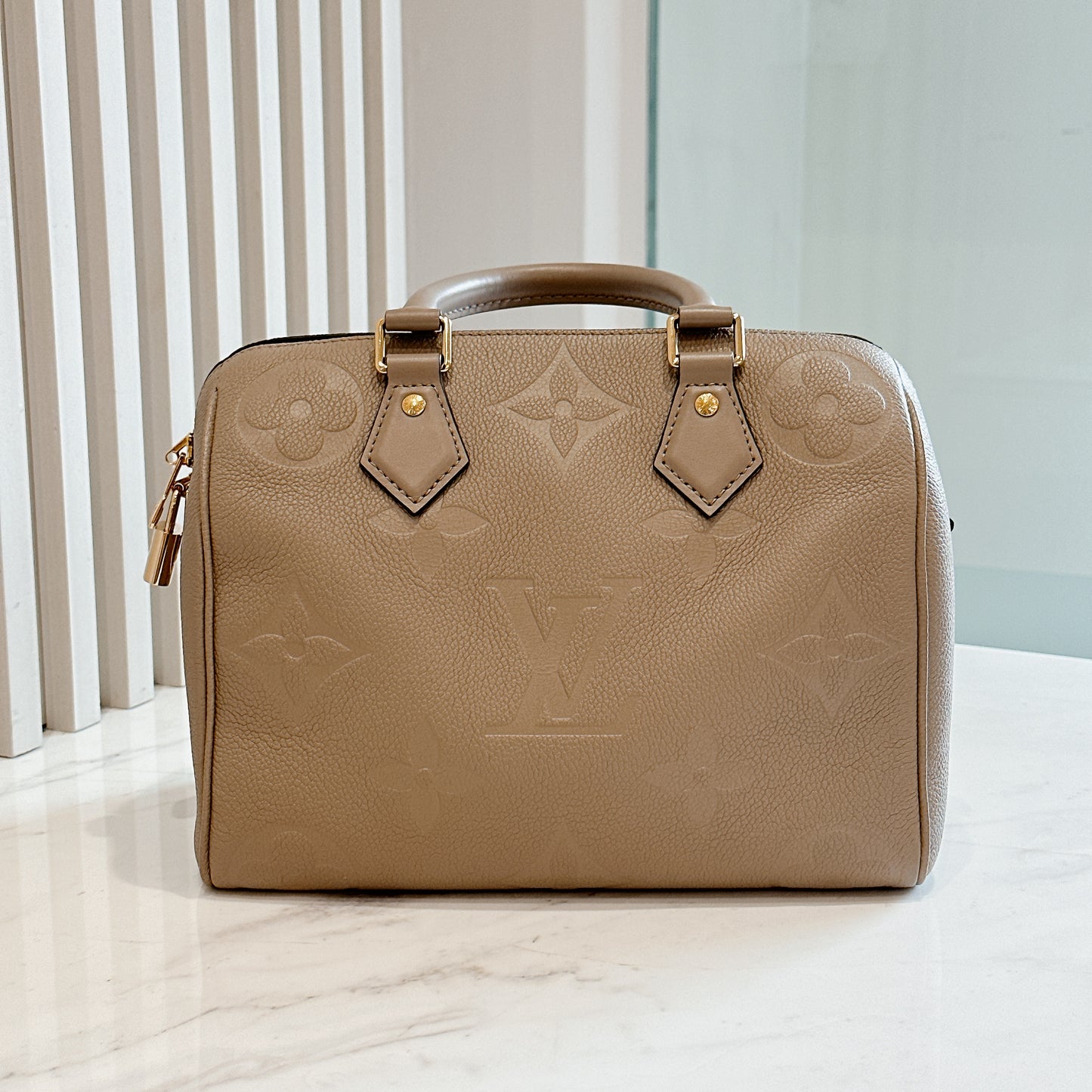 LV Speedy 25 in Tourterelle Empreinte Leather