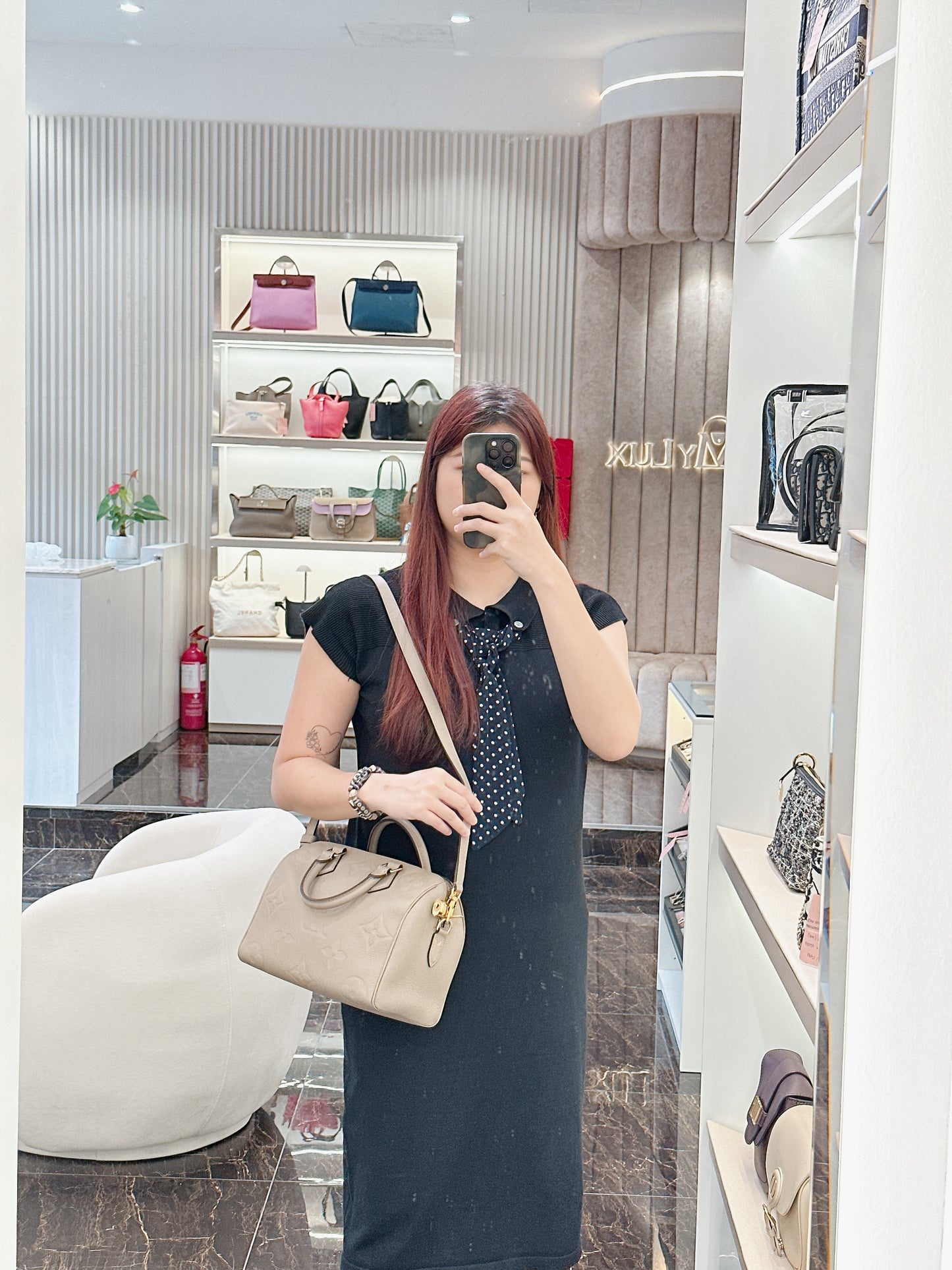 LV Speedy 25 in Tourterelle Empreinte Leather