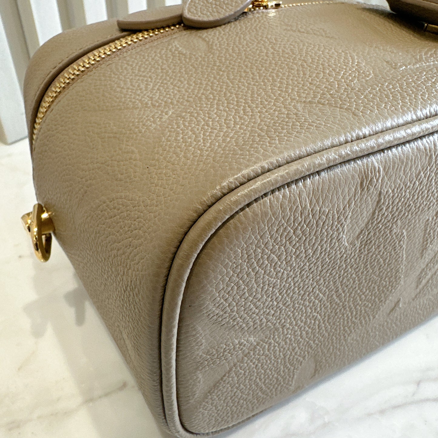 LV Empreinte Monogram Vanity PM Tourterelle