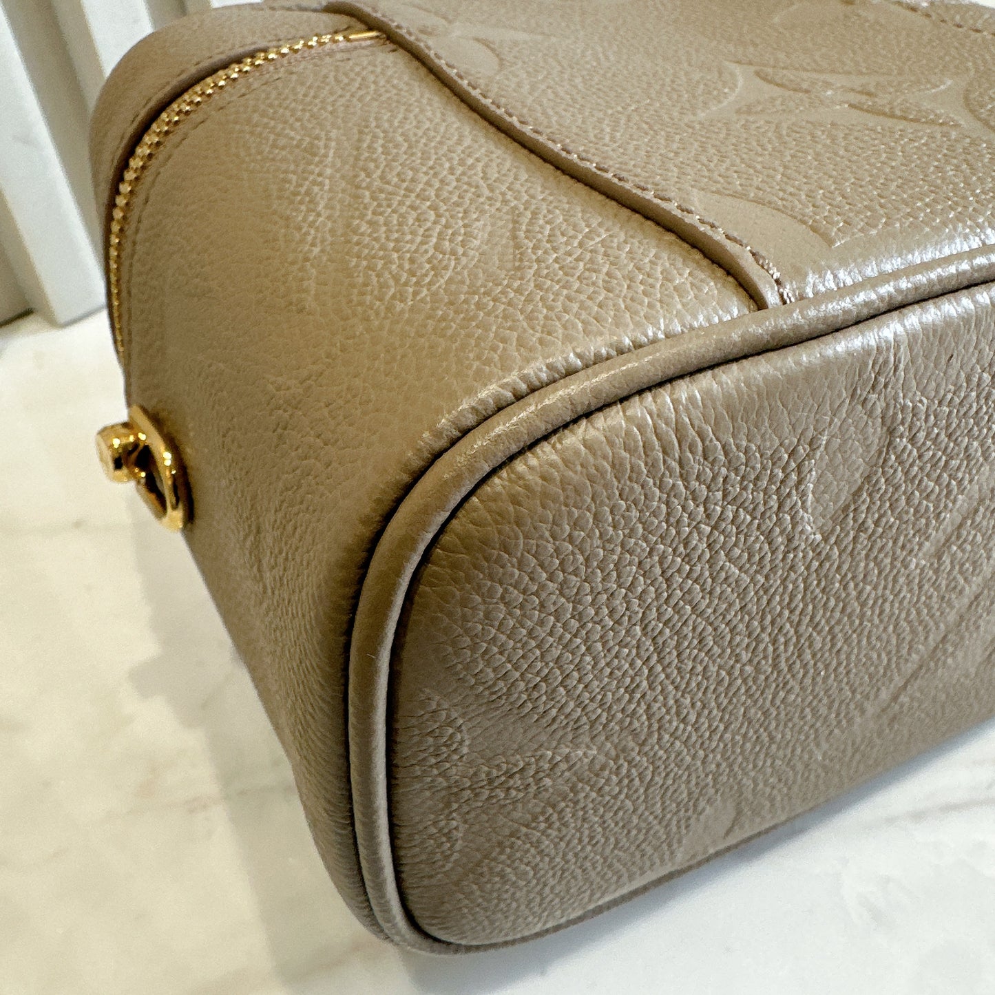 LV Empreinte Monogram Vanity PM Tourterelle