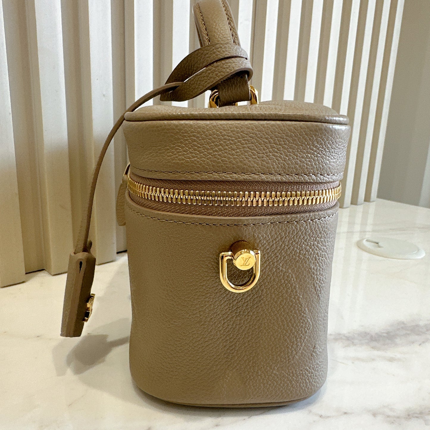LV Empreinte Monogram Vanity PM Tourterelle