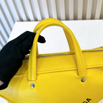 Balenciaga Small Triangle Duffle Bag In Yellow