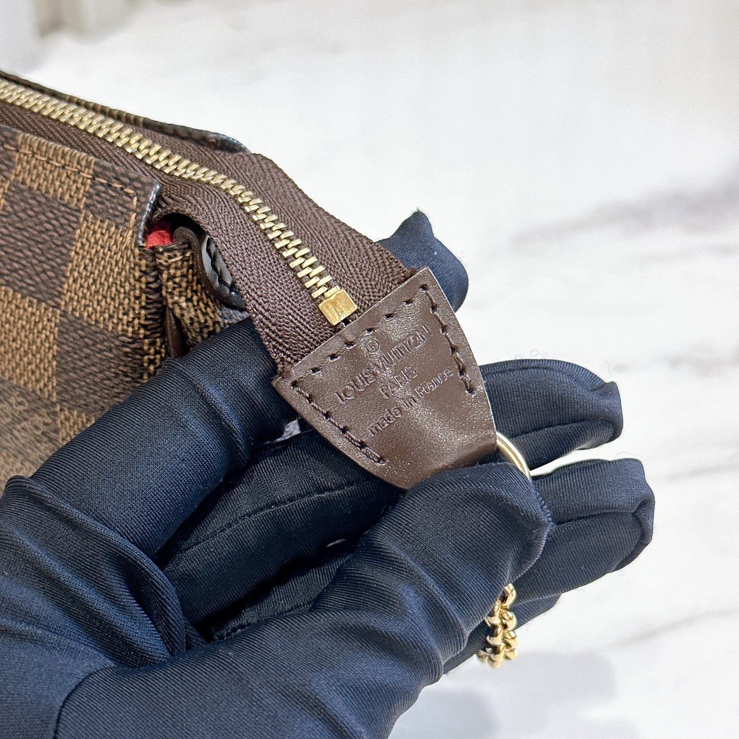 LV Damier Ebene Eva Clutch
