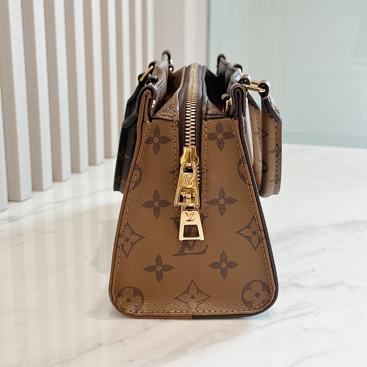 LV Monogram Reverse On The Go East West