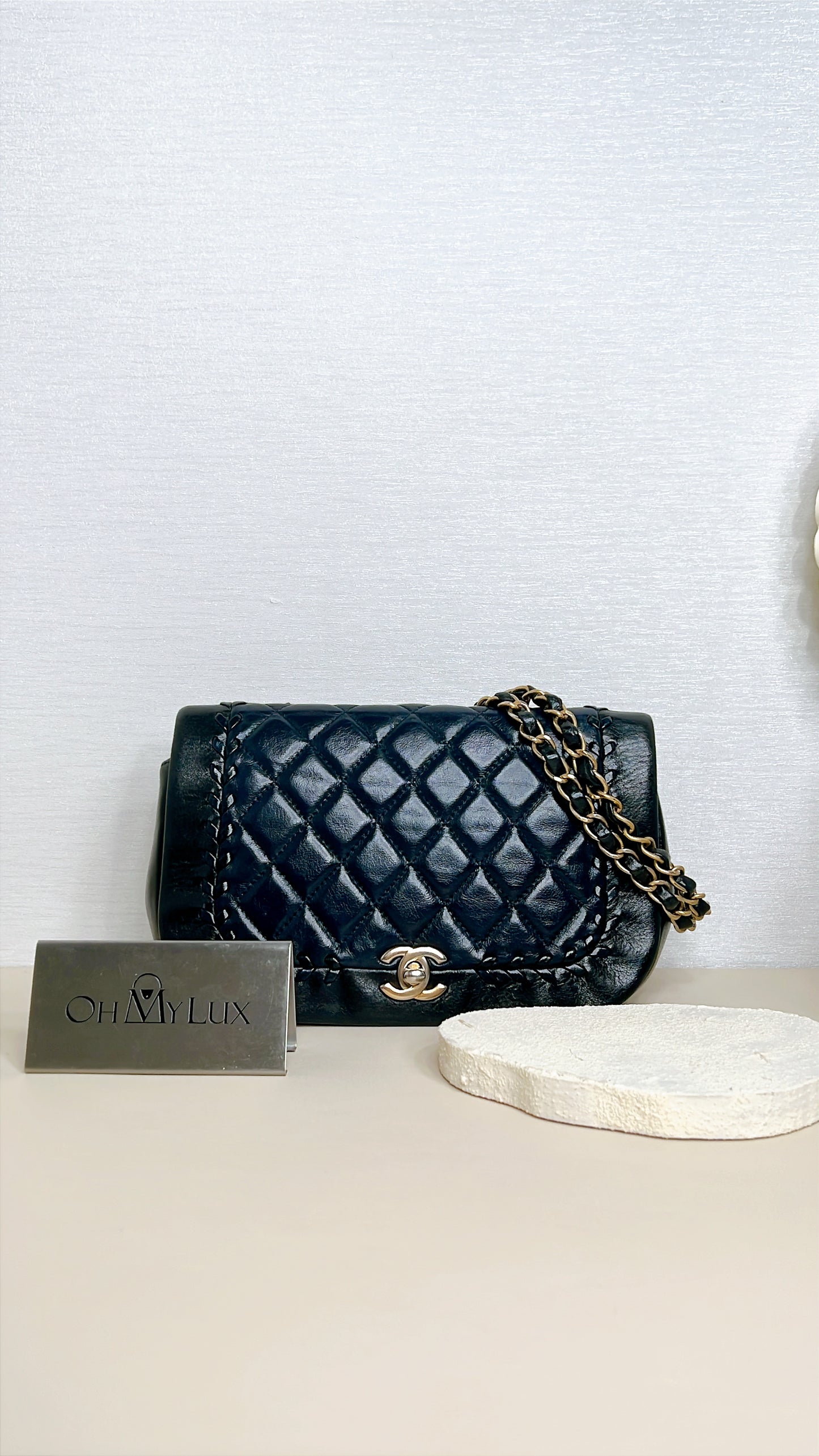 Chanel CC Braided Saddle Flap in Quilted Lambskin