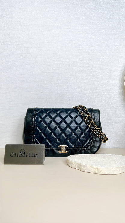 Chanel CC Braided Saddle Flap in Quilted Lambskin