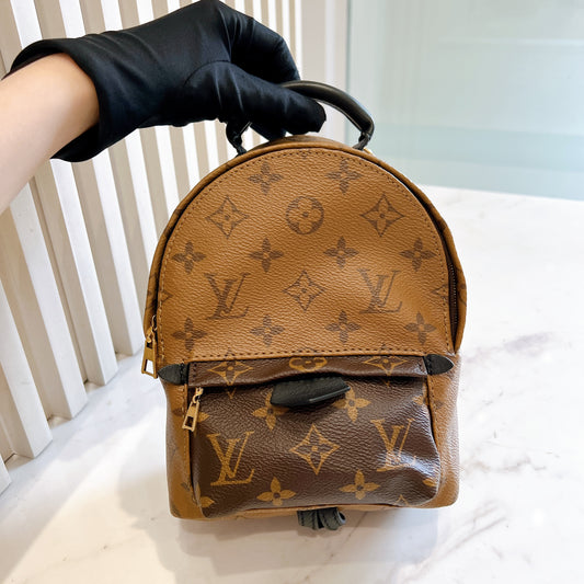 LV Palm Spring Mini in Reverse Monogram