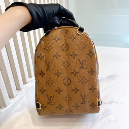 LV Palm Spring Mini in Reverse Monogram
