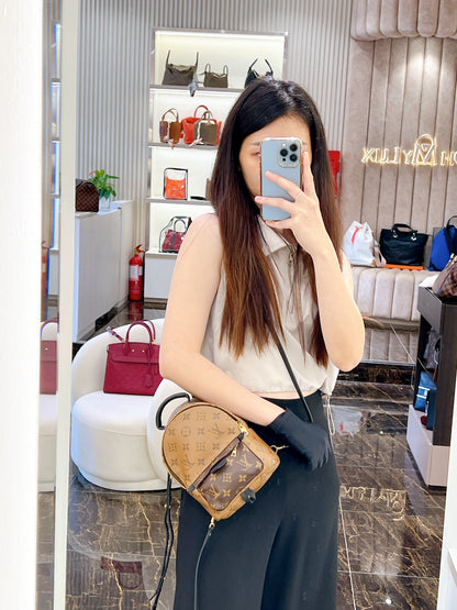 LV Palm Spring Mini in Reverse Monogram