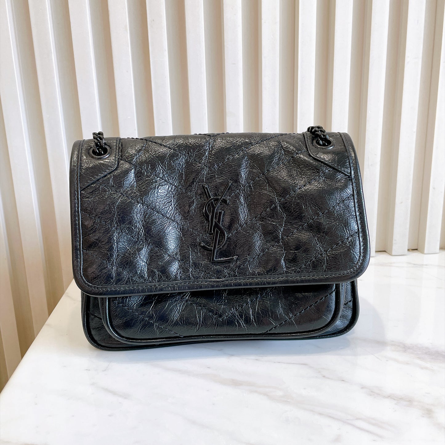 YSL Niki Baby in Vintage Leather Black