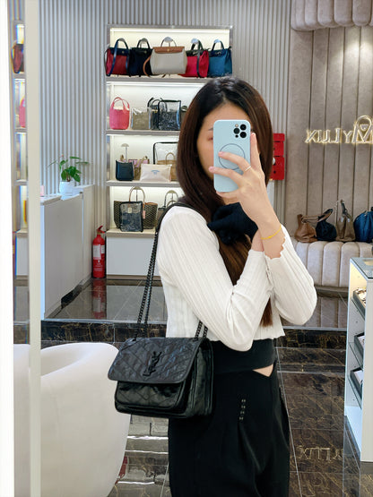 YSL Niki Baby in Vintage Leather Black