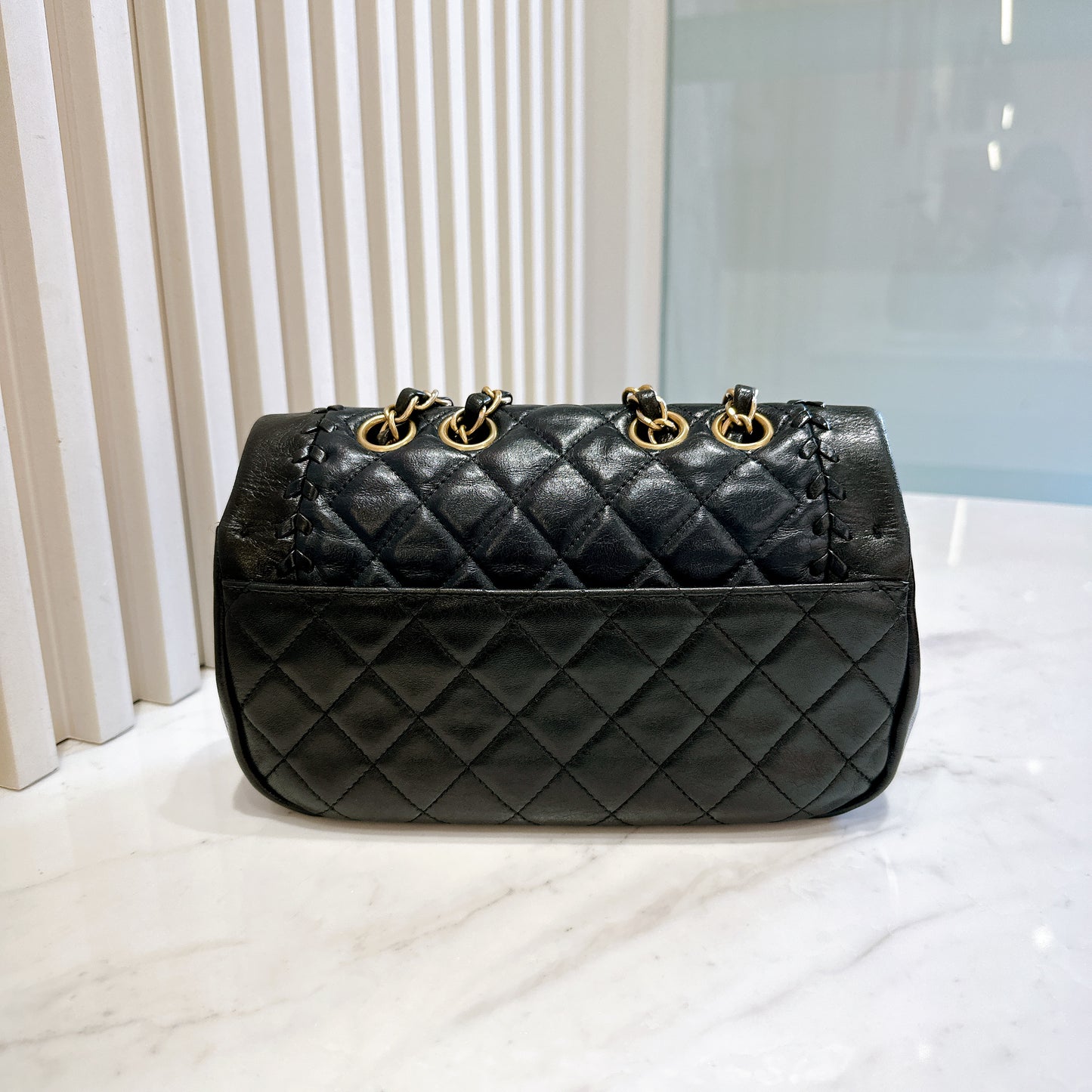Chanel CC Braided Saddle Flap in Quilted Lambskin