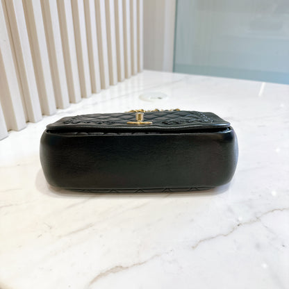 Chanel CC Braided Saddle Flap in Quilted Lambskin