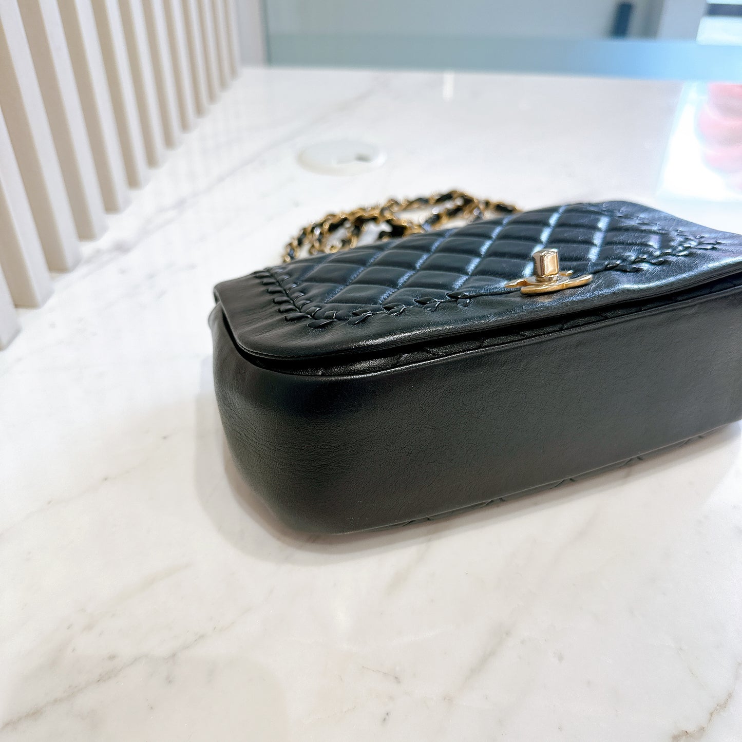Chanel CC Braided Saddle Flap in Quilted Lambskin