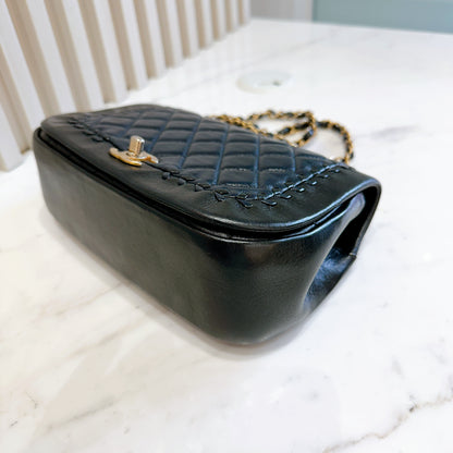 Chanel CC Braided Saddle Flap in Quilted Lambskin