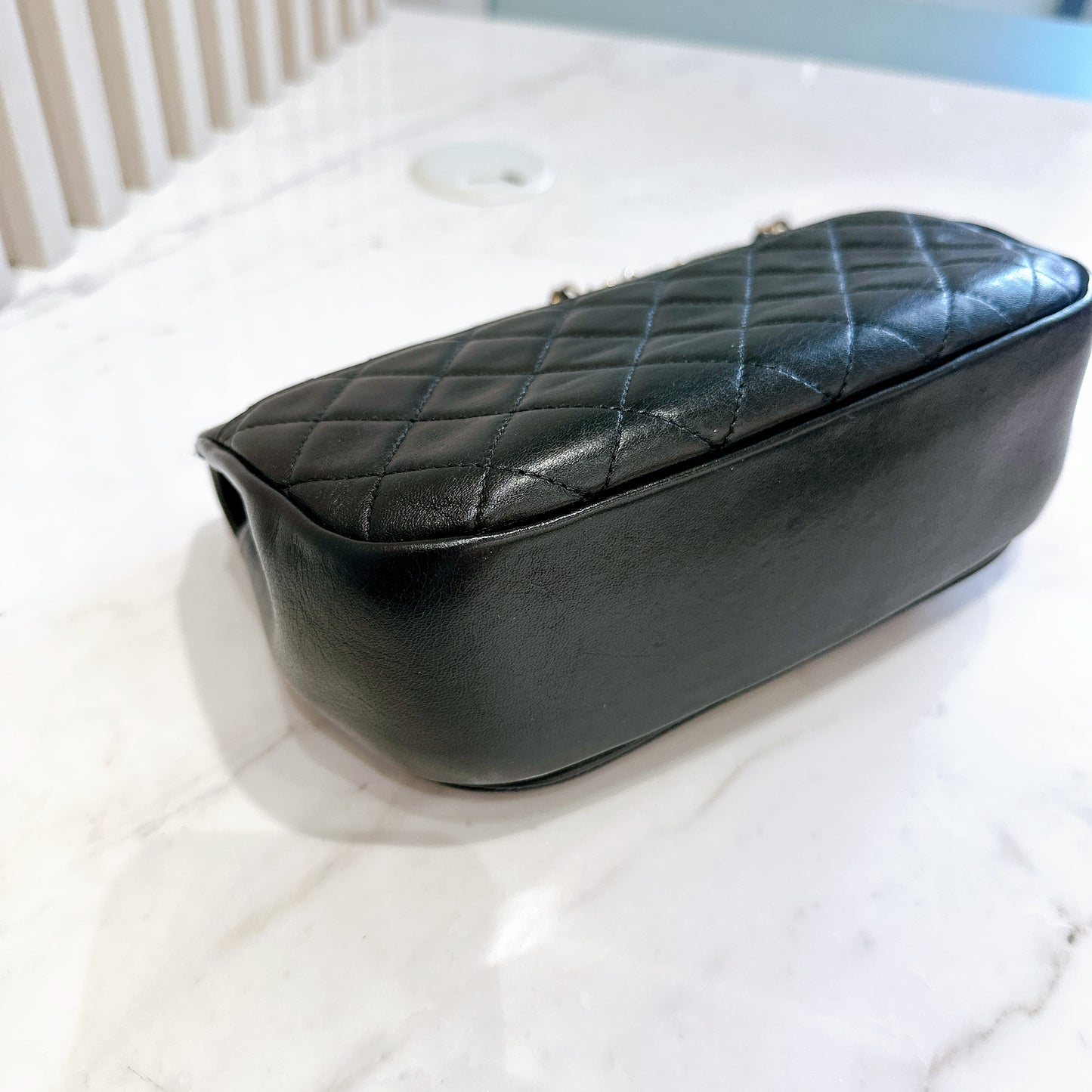 Chanel CC Braided Saddle Flap in Quilted Lambskin