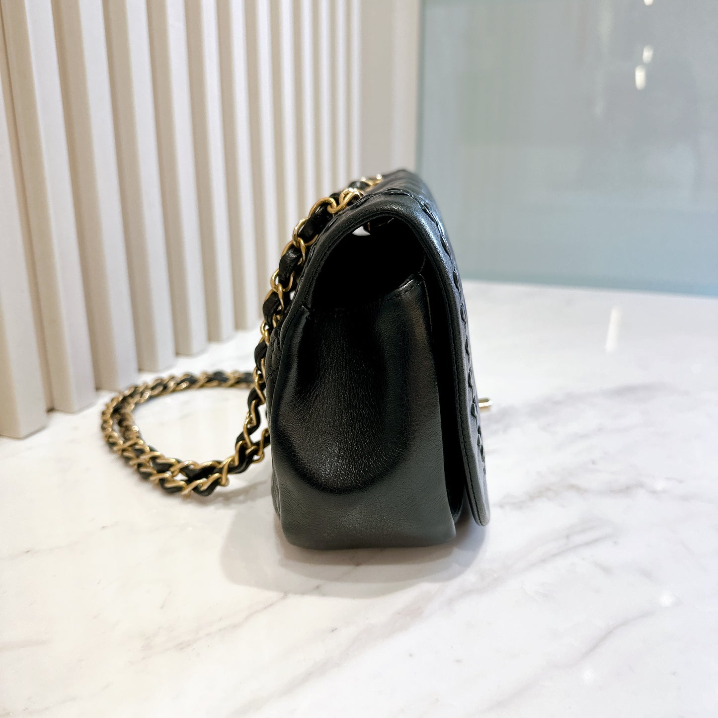 Chanel CC Braided Saddle Flap in Quilted Lambskin