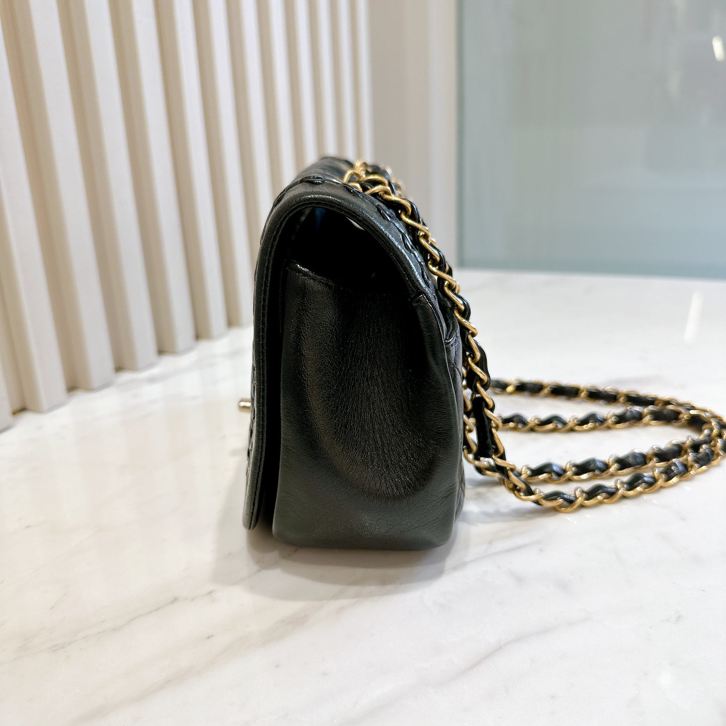 Chanel CC Braided Saddle Flap in Quilted Lambskin