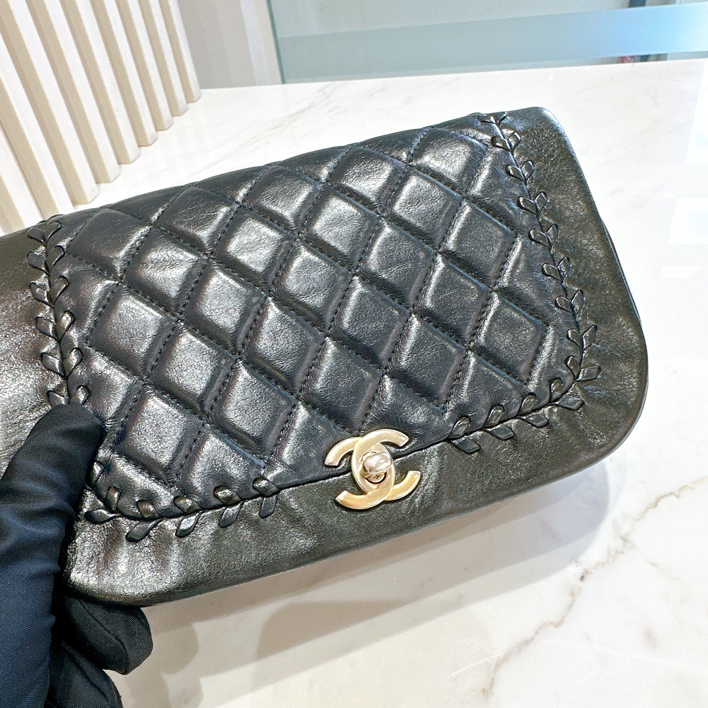 Chanel CC Braided Saddle Flap in Quilted Lambskin