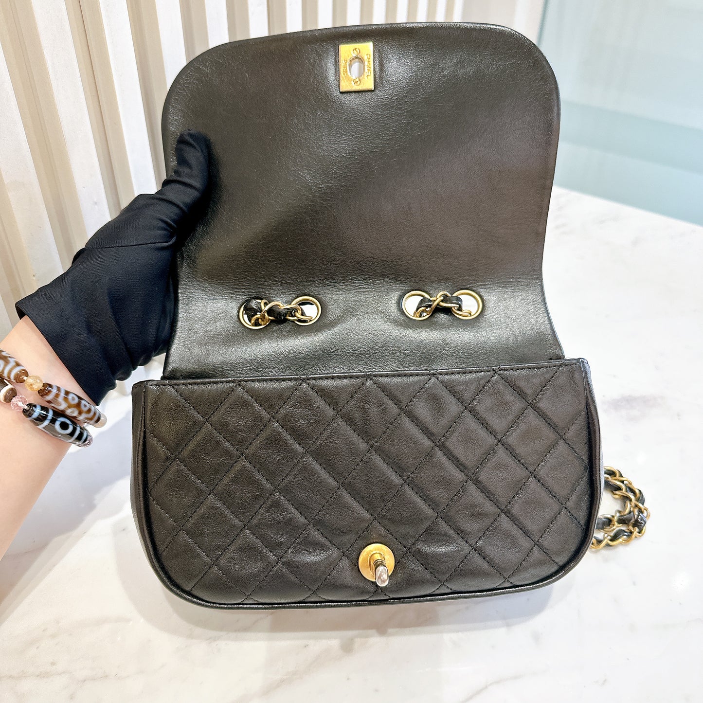 Chanel CC Braided Saddle Flap in Quilted Lambskin