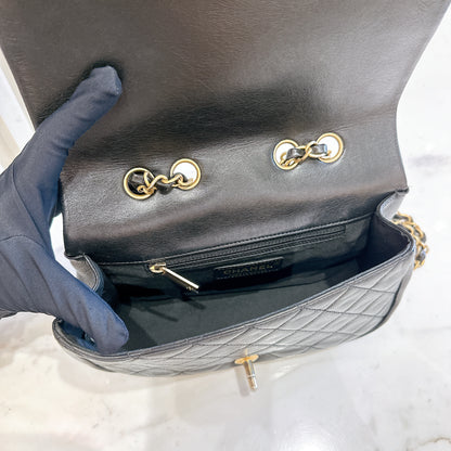 Chanel CC Braided Saddle Flap in Quilted Lambskin