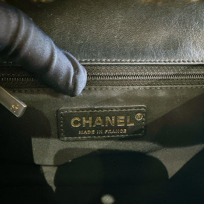 Chanel CC Braided Saddle Flap in Quilted Lambskin