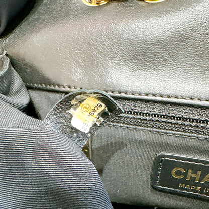 Chanel CC Braided Saddle Flap in Quilted Lambskin
