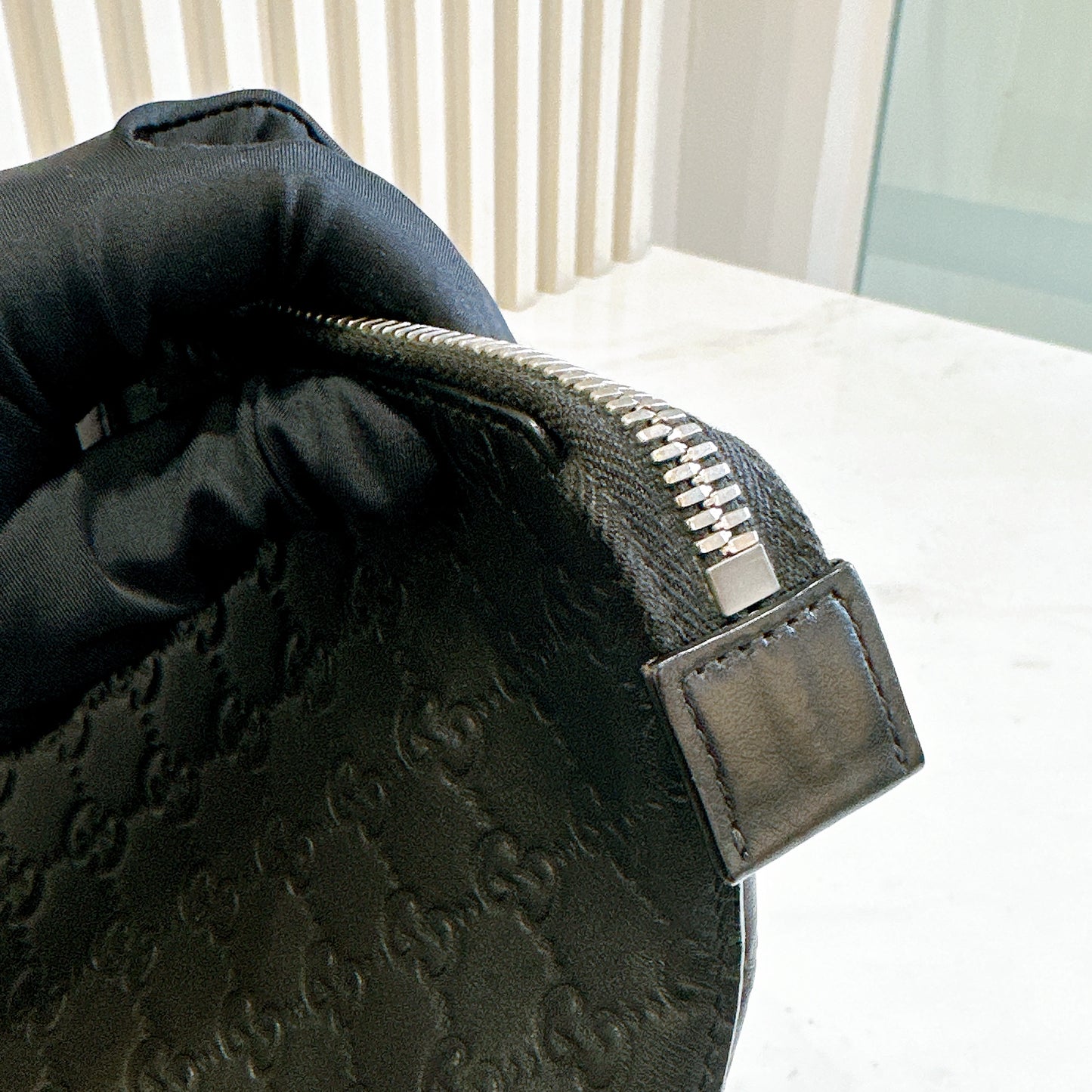 Gucci GG Guccissima Clutch in Black