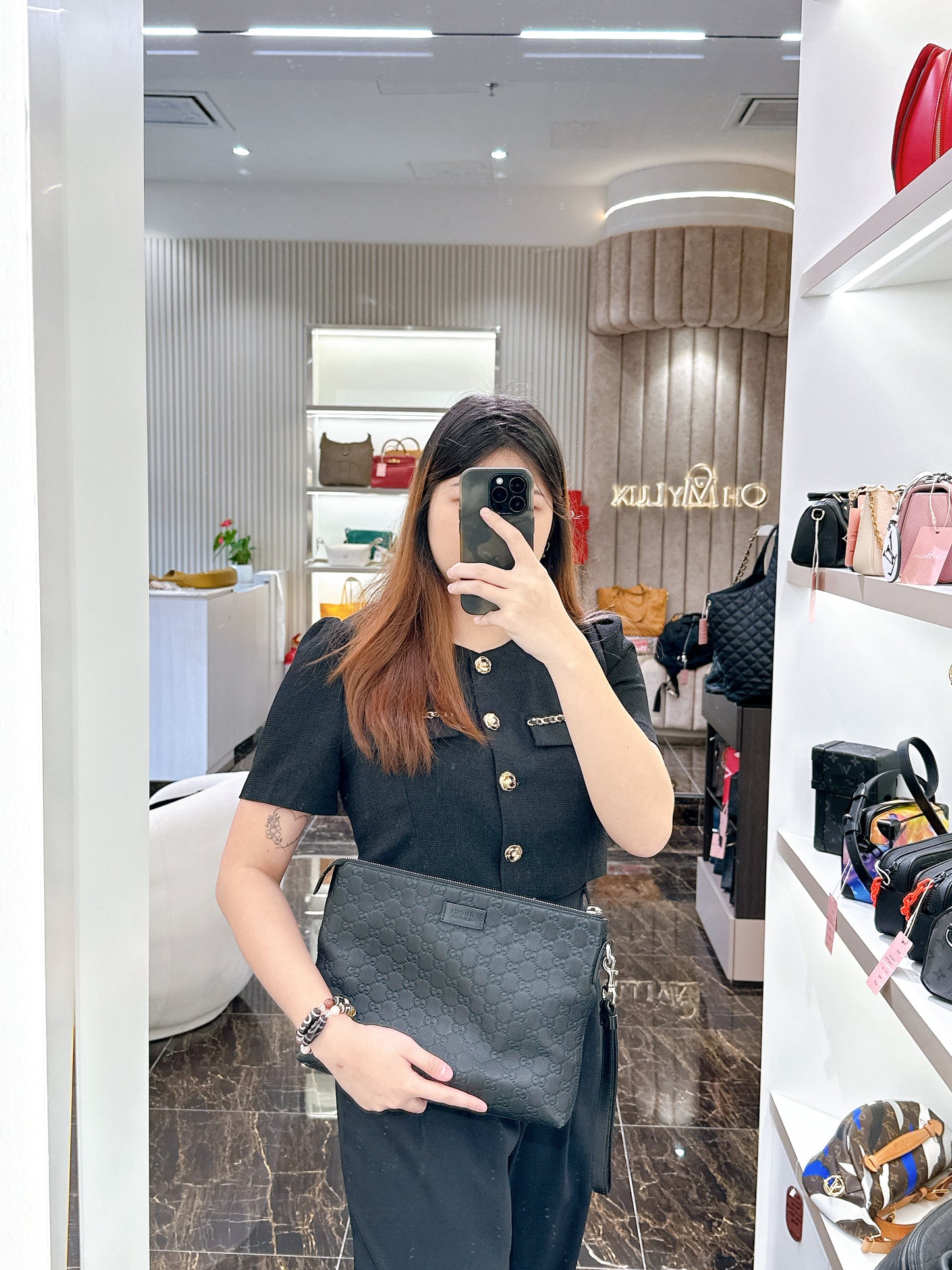 Gucci GG Guccissima Clutch in Black