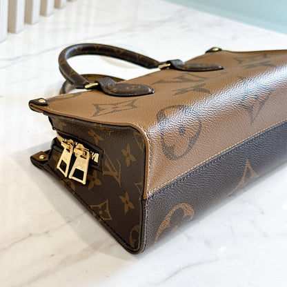 LV On The Go East West in Monogram Reverse