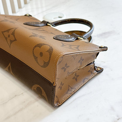 LV On The Go East West in Monogram Reverse