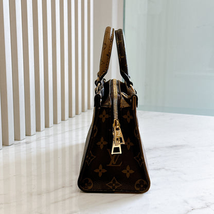 LV On The Go East West in Monogram Reverse