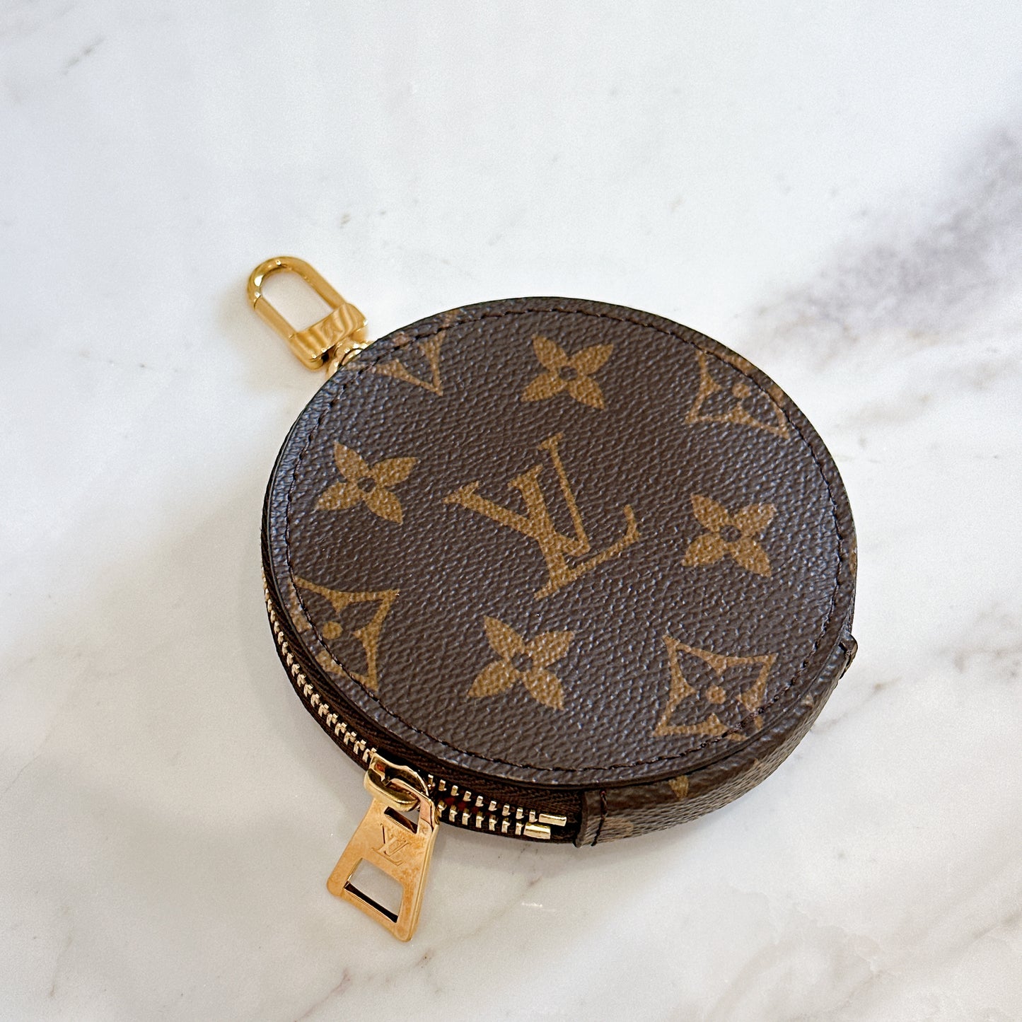 LV On The Go East West in Monogram Reverse