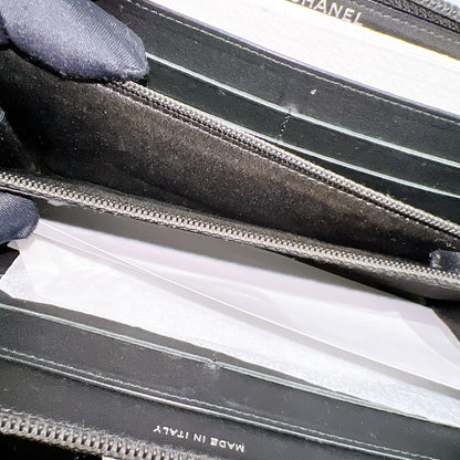 Chanel Patent Camellia Zippy Wallet