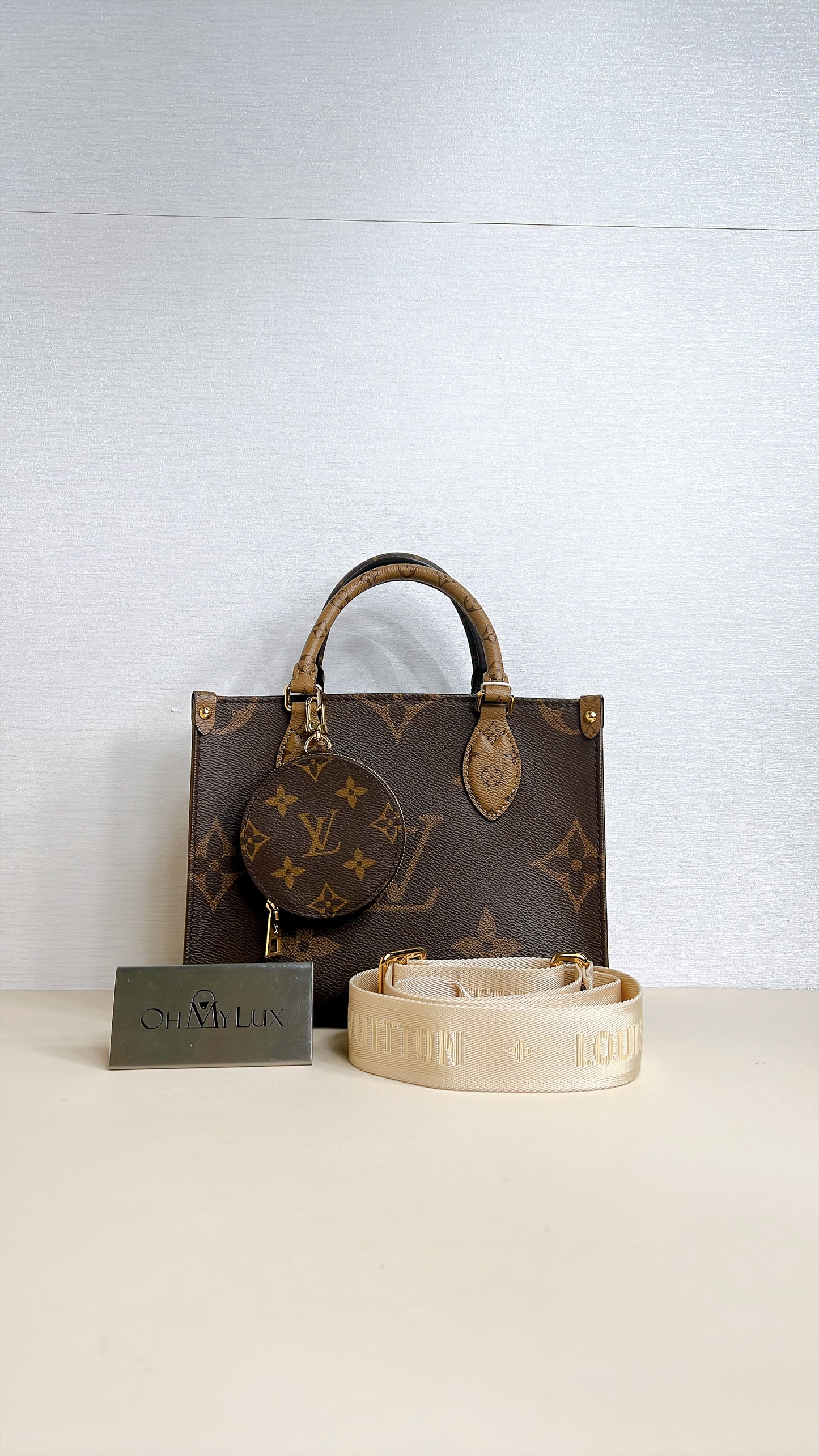 LV On The Go PM in Reverse Monogram