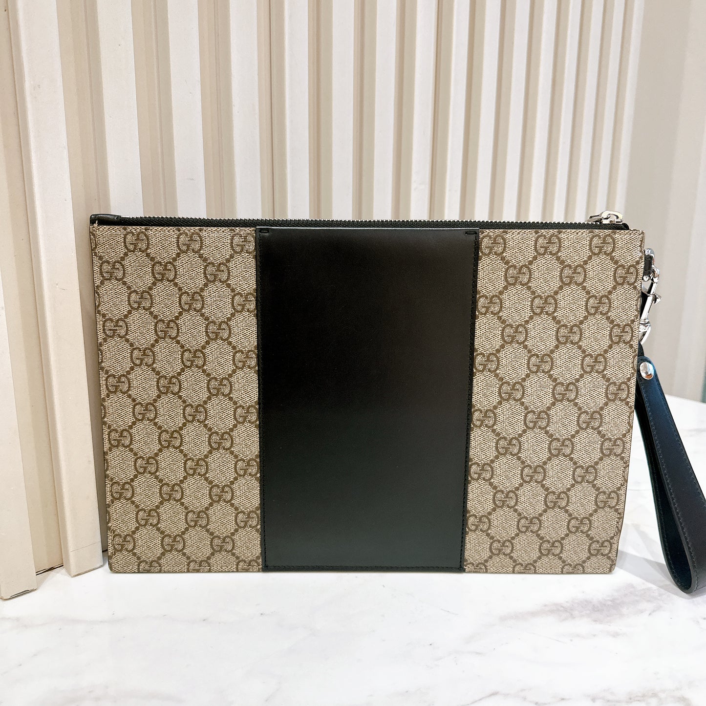 Gucci Supreme Clutch