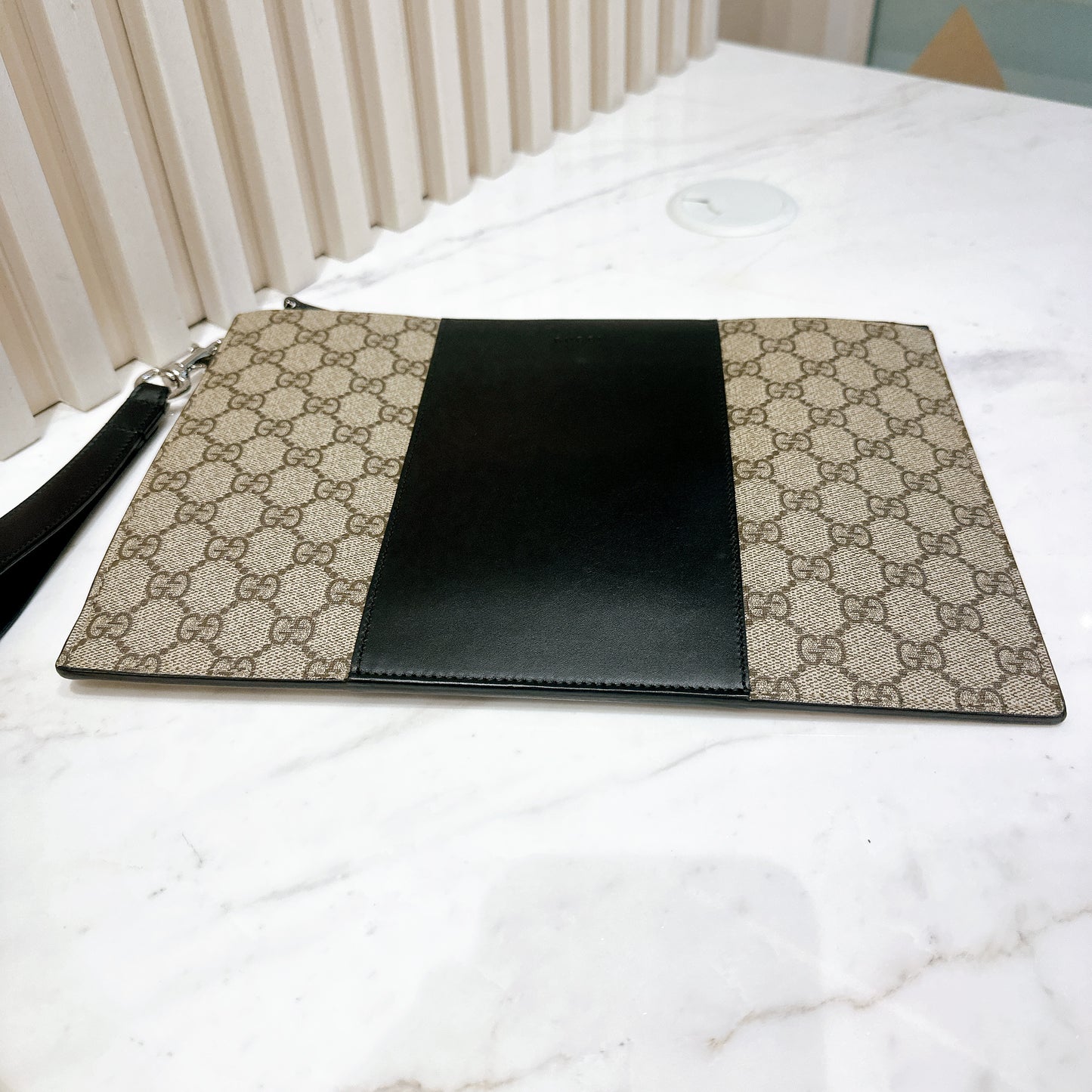 Gucci Supreme Clutch