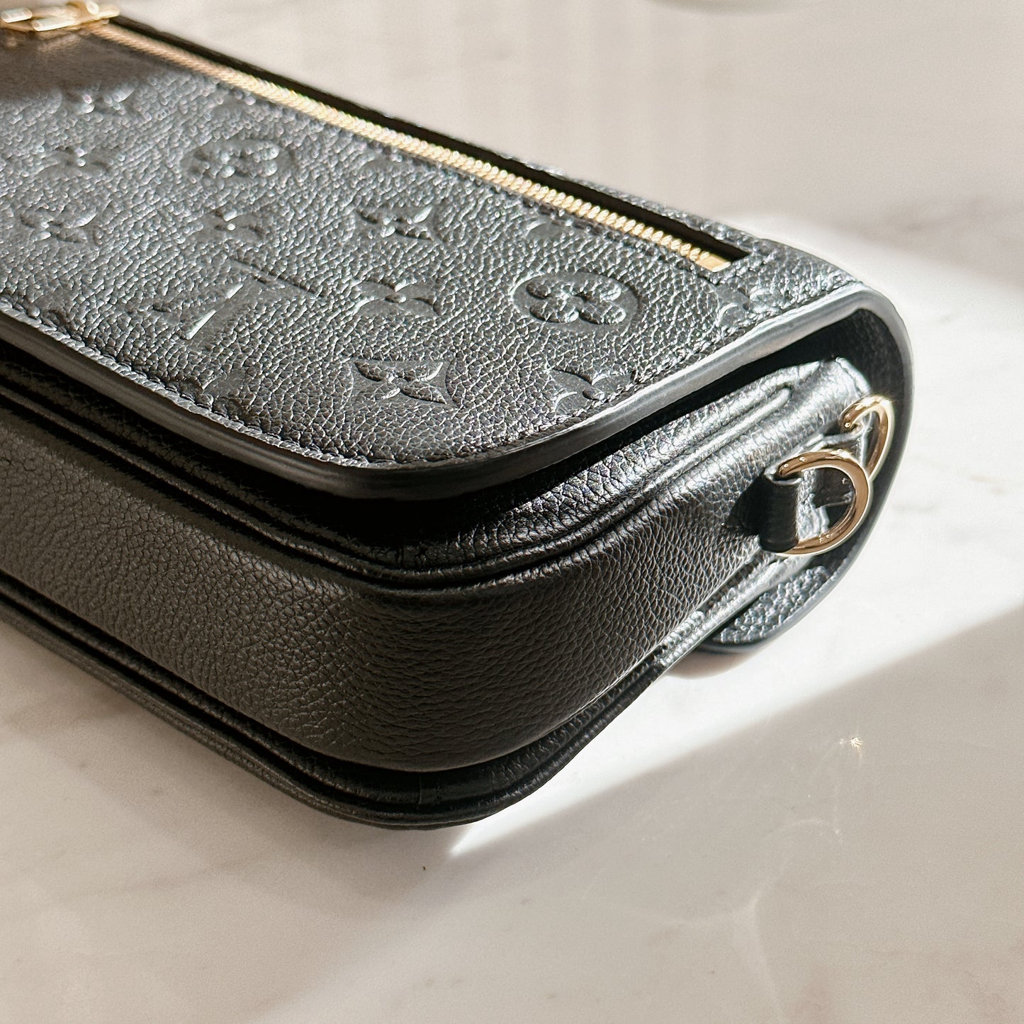 LV Metis East West In Black Empreinte Leather