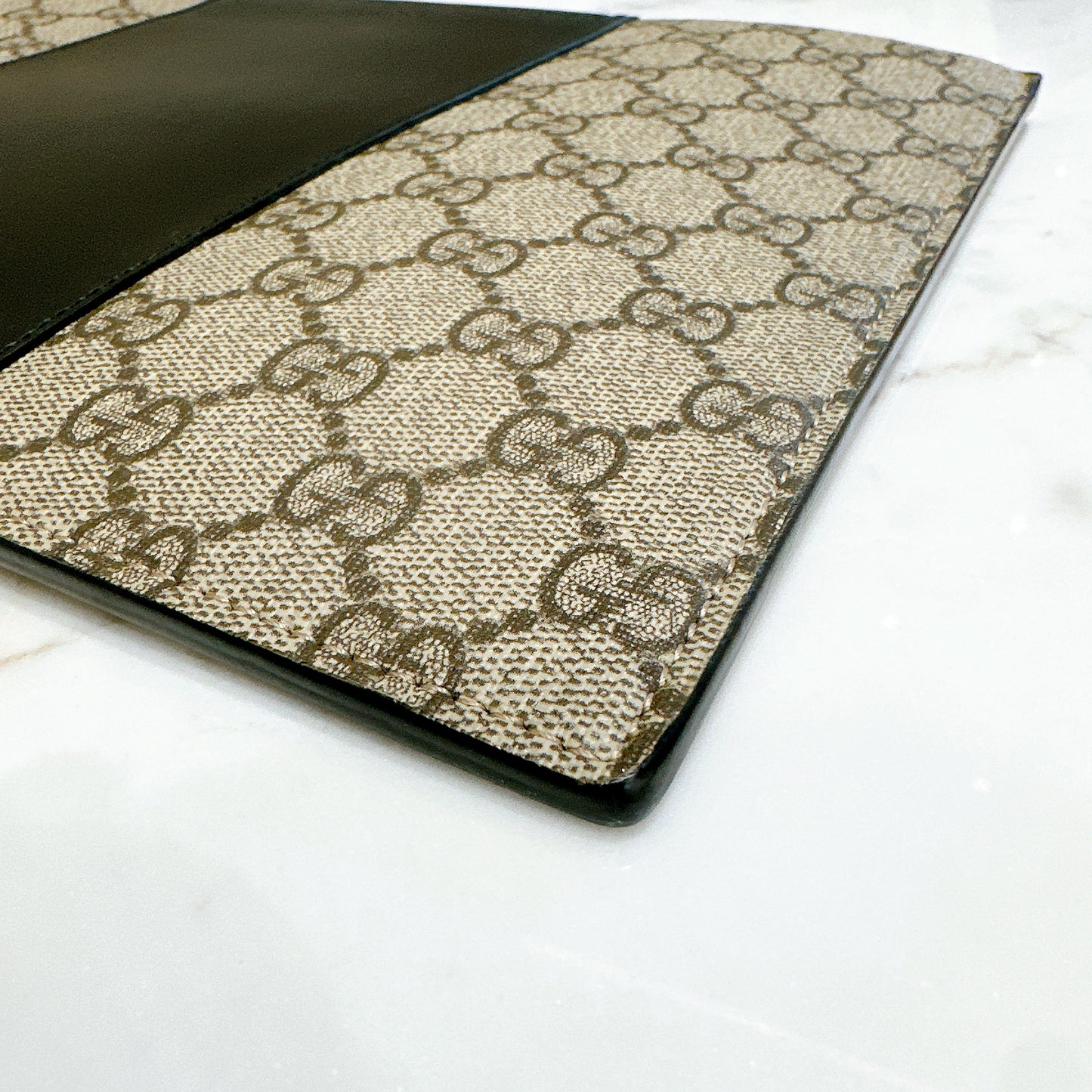 Gucci Supreme Clutch