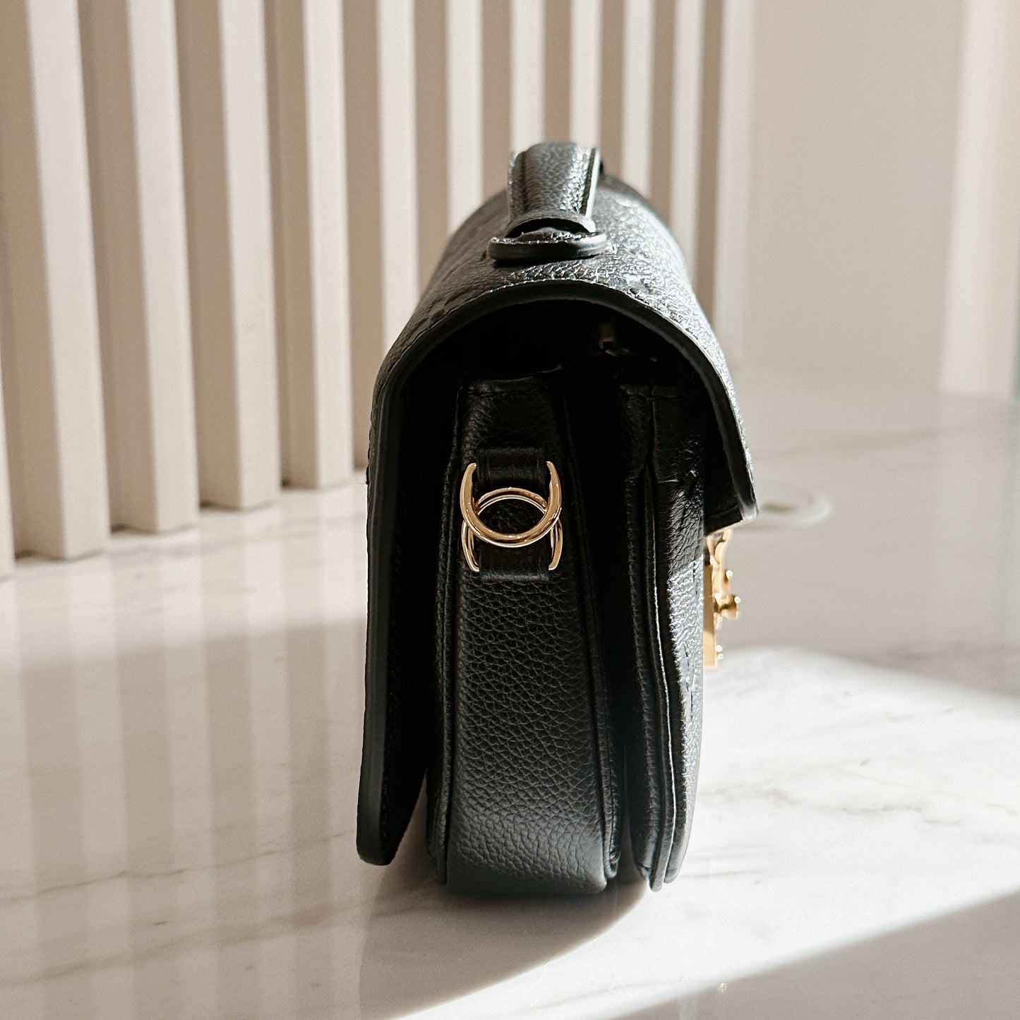 LV Metis East West In Black Empreinte Leather