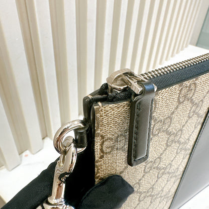 Gucci Supreme Clutch