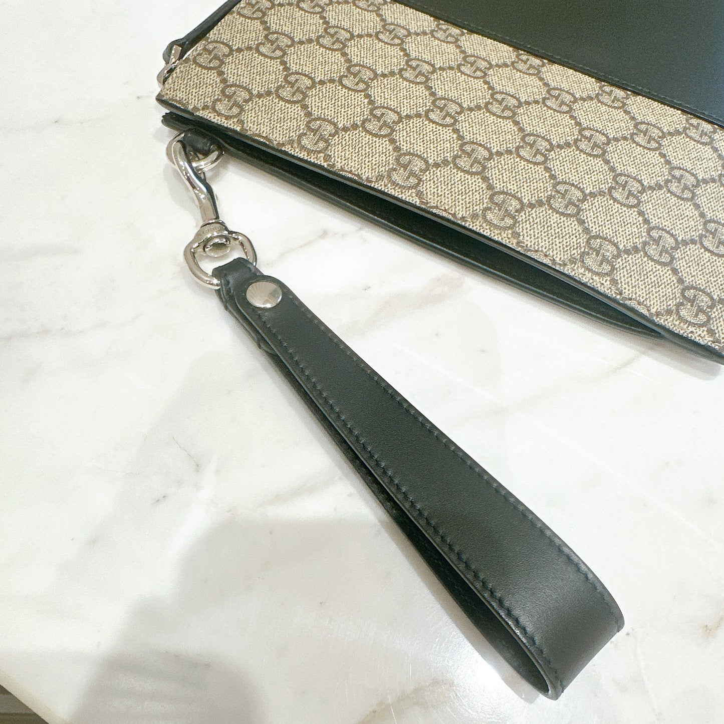 Gucci Supreme Clutch